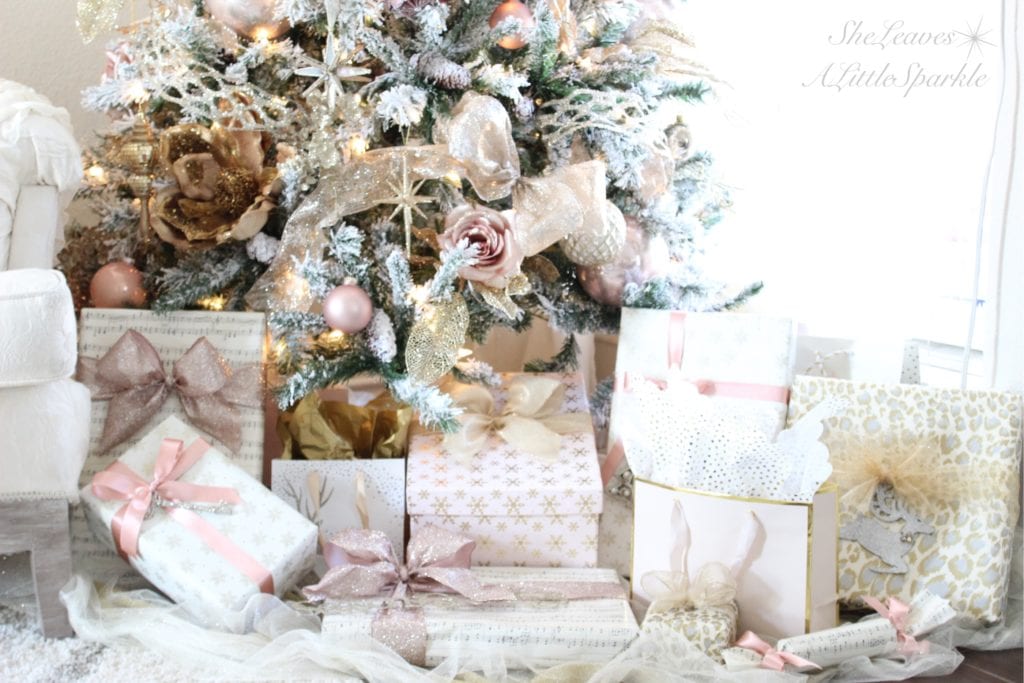 Holiday Living Room Tour blush gold flocked christmas tree blush wrapping paper pink christmas