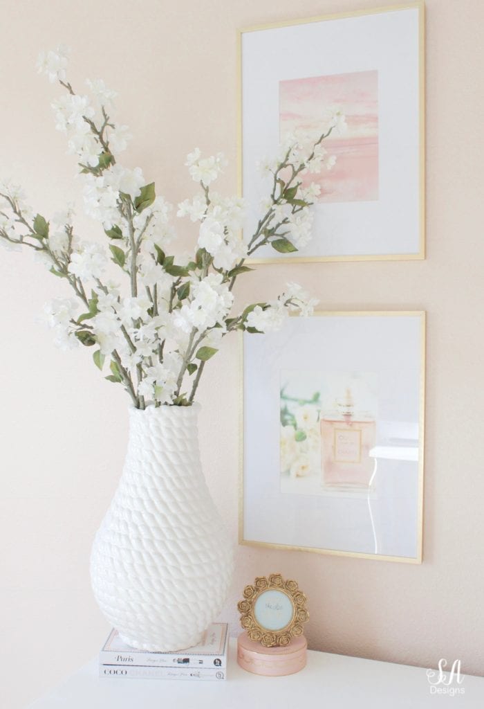 blush pink interior paint walls, glam style office, decorating with books styling with books, megan hess books