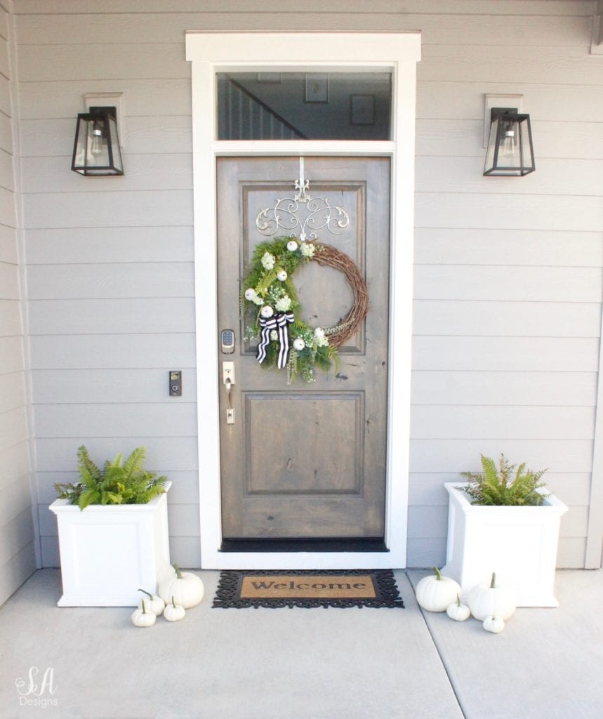 mini white pumpkins, diy pumpkin wreath, diy fall wreath, fall pumpkin wreath, fall wreath, white coastal nantucket planters, cape cod planters, white nantucket planters, front door ferns shade plants, white pumpkins, fall front porch, craftsman style home