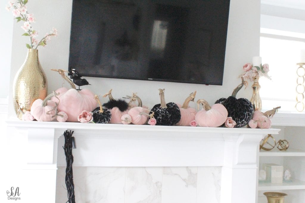 glam halloween mantel, chic halloween mantle mantel, pink and black leopard halloween hotskwash velvet pumpkins, black witches broom