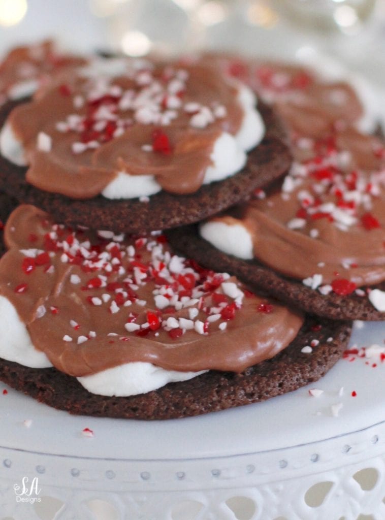 christmas cookie recipe, chocolate cookie marshmallows peppermint candy cane, cookie exchange party, chandelier cake stand, mercury glass christmas tree pottery barn, twinkle lights, faux fur table runner