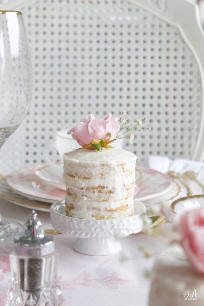 individual mini naked white cake on cupcake stand