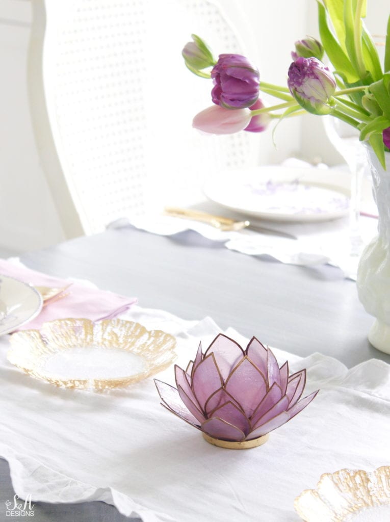 summer tablescape, spring tablescape, purple tablescape, purple tulips arrangement, purple lavender tulips, purple double peony tulips, double tulip peonies, antique french lavender transferware plates, paris france flea market find, gold flatware, purple orchid dinner napkins world market, gold rimmed crystal goblets, purple petal lotus capiz tea light holder world market, white ruffle linen table runners, crystorama clear crystal chandelier, anthropologie mauve lavender blouse top, white kitchen design, pacific northwest interior designer blogger fashion blogger summer adams designs, white milkglass vase