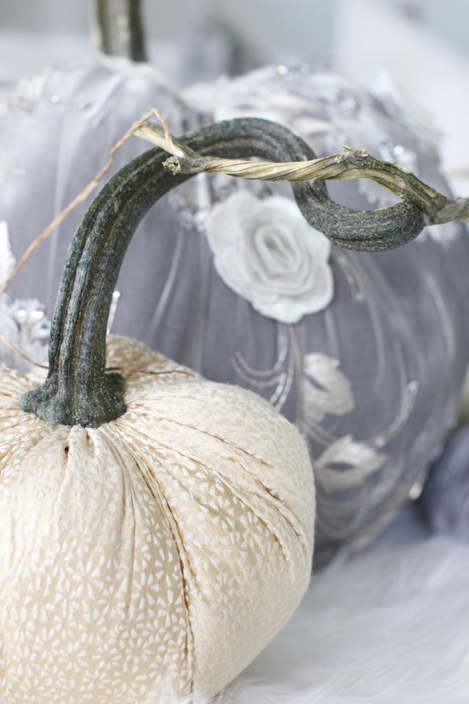 champagne colored fabric pumpkins,Hot Skwash Velvet Pumpkins, Fall decor, glam fall decor, classy fall decor, elegant fall decor, neutral fall decor, custom velvet handmade pumpkins, gray and gold living room, gray and gold fall decor, grey and gold fall glam elegant classy living room