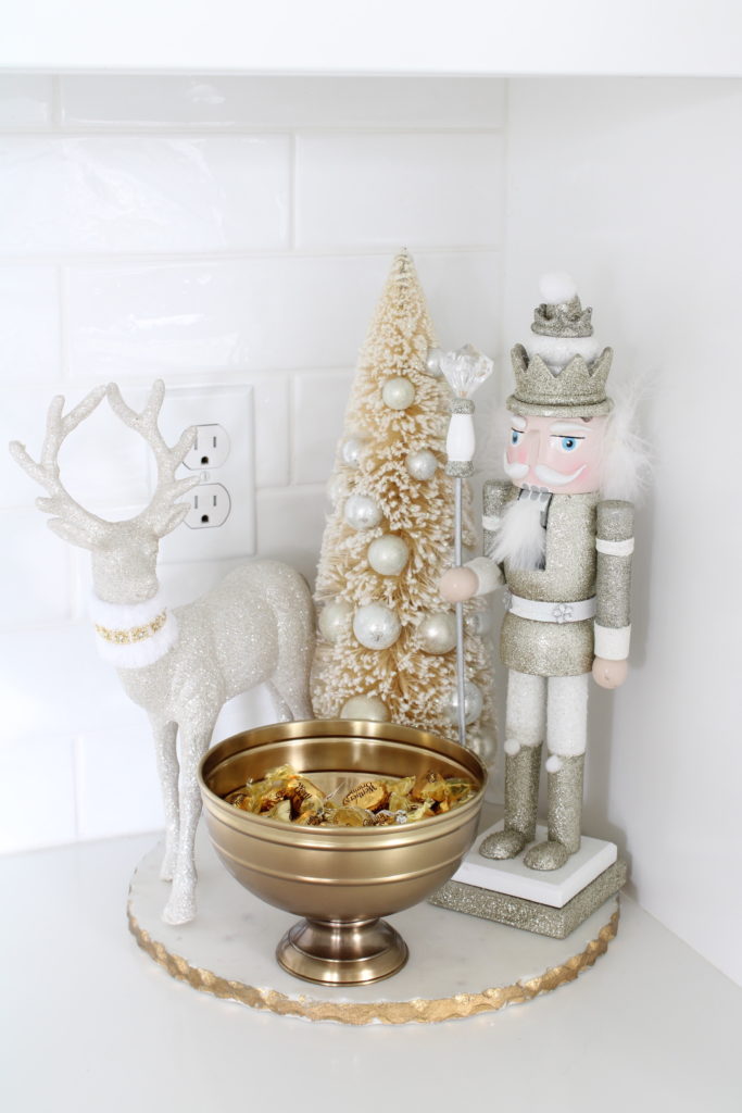 white and gold Christmas kitchen, glam Christmas kitchen, ribbon bows on kitchen pendants lighting, Christmas bows on kitchen lights, elegant Christmas kitchen, classy Christmas kitchen decorating, d. Stevens white and gold rhinestone Christmas ribbon, specialty white velvet gold rhinestone wired edge ribbon, gold barstools, Christmas floral arrangements, white and gold Christmas wreath, white kitchen design, white Christmas decor, white and gold Christmas kitchen decor, nutcracker 