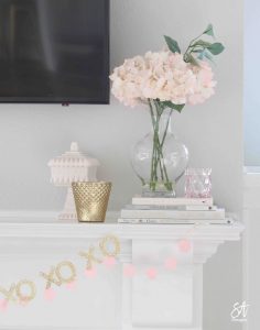 Voluspa candles, Voluspa 123 oz rose candle, valentines diy fresh flowers arrangement at home, classy Valentine's Day decor, elegant Valentine's decor, soft romantic pink Valentine's Day decor, glam Valentine's decorations, classy elegant glam Valentine's pennant banner garland, Valentine's flower arrangements, pink ginger jars, Valentine's candy bar buffet, Valentine's cocoa hot chocolate bar, Valentine's bar cart, Valentine's living room decor, Valentine's entry way decor, classy glam elegant Valentine's Day decorating ideas, white kitchen decorated for Valentine's Day, elegant Valentine's tablescapes, gold mirrored tray, gold sequin heart banner, mercury glass votives pottery barn, ruffle cake stand, voluspa macaron candles, milk glass pedestal bowls