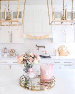 Voluspa candles, Voluspa 123 oz rose candle, valentines diy fresh flowers arrangement at home, classy Valentine's Day decor, elegant Valentine's decor, soft romantic pink Valentine's Day decor, glam Valentine's decorations, classy elegant glam Valentine's pennant banner garland, Valentine's flower arrangements, pink ginger jars, Valentine's candy bar buffet, Valentine's cocoa hot chocolate bar, Valentine's bar cart, Valentine's living room decor, Valentine's entry way decor, classy glam elegant Valentine's Day decorating ideas, white kitchen decorated for Valentine's Day, elegant Valentine's tablescapes, gold mirrored tray, gold sequin heart banner, mercury glass votives pottery barn, ruffle cake stand, voluspa macaron candles, milk glass pedestal bowls