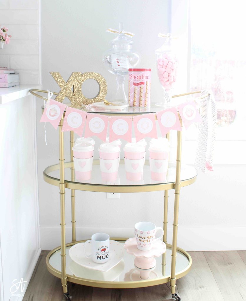 hot cocoa bar cart, candy bar buffet, Valentine's Day candy buffet bar cart, Valentine's Day bar cart, free valentine's printable, free Valentine's Day download, free printable for Valentine's Day, pink Valentine's Day garland banner free, candy bar buffet banner garland, pink and red banner garland, pink hot cocoa banner garland, free hot cocoa banner garland, whimsical hot cocoa banner, whimsical candy garland banner