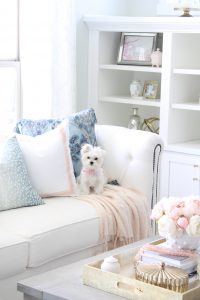 Caitlin Wilson pillows, crystorama chandelier, calypso chandelier, blue and white striped slipper chair, white tufted sofa, spring decorating tips, how to decorate your home for spring, blogger spring home tour, spring home goals, hgtv spring home design inspiration, gorgeous spring decorating, glam spring decor, elegant spring decor, pink and blue spring decorating tips ideas