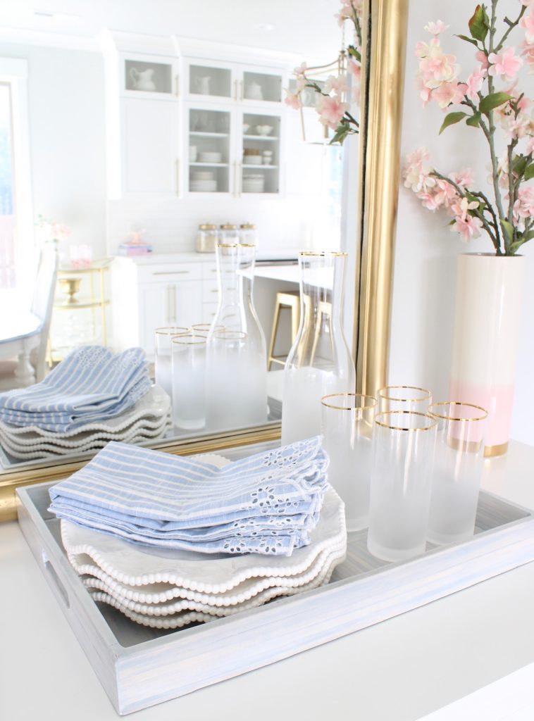 white and blue dining room spring decor and serve ware 