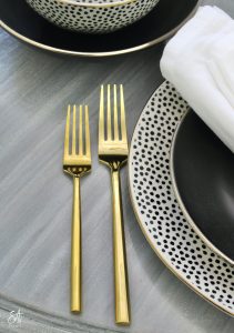 walmart dinnerware, affordable dinnerware, glam modern dinnerware, modern place settings, velvet pumpkins, black and white halloween table, white cloth dinner napkin, gold jewel spider napkin ring, halloween napkin rings, gold flatware, clear goblets gold rimmed