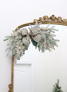 ornate aqua spa blue 2.5" wired ribbon, designer christmas tree ribbon, designer christmas tree, glam christmas tree, blogger influencer christmas tree design, how to place ribbon on christmas tree, flocked christmas tree, 12' christmas tree, entry way christmas design, christmas inspiration, sugar paper target christmas wrap boxes, pottery barn mercury glass christmas trees, anthropologie gleaming primrose 5' mirror, christmas entry inspo decorating, glam christmas