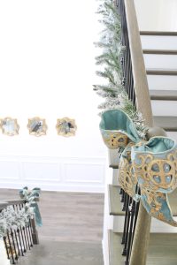 how to hang garland on staircase banister