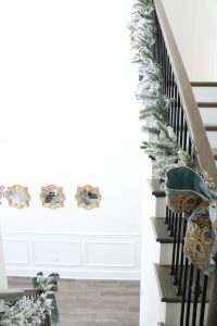 how to hang garland on staircase banister
