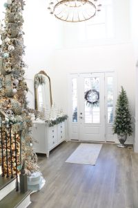 ornate aqua spa blue 2.5" wired ribbon, designer christmas tree ribbon, designer christmas tree, glam christmas tree, blogger influencer christmas tree design, how to place ribbon on christmas tree, flocked christmas tree, 12' christmas tree, entry way christmas design, christmas inspiration, sugar paper target christmas wrap boxes, pottery barn mercury glass christmas trees, anthropologie gleaming primrose 5' mirror, christmas entry inspo decorating, glam christmas