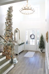 ornate aqua spa blue 2.5" wired ribbon, designer christmas tree ribbon, designer christmas tree, glam christmas tree, blogger influencer christmas tree design, how to place ribbon on christmas tree, flocked christmas tree, 12' christmas tree, entry way christmas design, christmas inspiration, sugar paper target christmas wrap boxes, pottery barn mercury glass christmas trees, anthropologie gleaming primrose 5' mirror, christmas entry inspo decorating, glam christmas