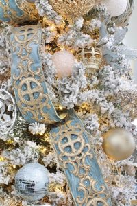 ornate aqua spa blue 2.5" wired ribbon, designer christmas tree ribbon, designer christmas tree, glam christmas tree, blogger influencer christmas tree design, how to place ribbon on christmas tree, flocked christmas tree, 12' christmas tree, entry way christmas design, christmas inspiration, sugar paper target christmas wrap boxes, pottery barn mercury glass christmas trees, anthropologie gleaming primrose 5' mirror, christmas entry inspo decorating, glam christmas