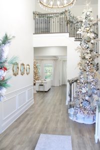 ornate aqua spa blue 2.5" wired ribbon, designer christmas tree ribbon, designer christmas tree, glam christmas tree, blogger influencer christmas tree design, how to place ribbon on christmas tree, flocked christmas tree, 12' christmas tree, entry way christmas design, christmas inspiration, sugar paper target christmas wrap boxes, pottery barn mercury glass christmas trees, anthropologie gleaming primrose 5' mirror, christmas entry inspo decorating, glam christmas