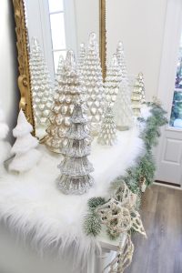 ornate aqua spa blue 2.5" wired ribbon, designer christmas tree ribbon, designer christmas tree, glam christmas tree, blogger influencer christmas tree design, how to place ribbon on christmas tree, flocked christmas tree, 12' christmas tree, entry way christmas design, christmas inspiration, sugar paper target christmas wrap boxes, pottery barn mercury glass christmas trees, anthropologie gleaming primrose 5' mirror, christmas entry inspo decorating, glam christmas