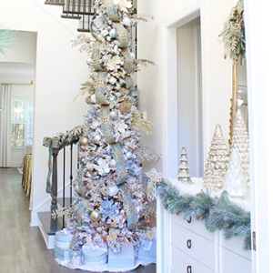 ornate aqua spa blue 2.5" wired ribbon, designer christmas tree ribbon, designer christmas tree, glam christmas tree, blogger influencer christmas tree design, how to place ribbon on christmas tree, flocked christmas tree, 12' christmas tree, entry way christmas design, christmas inspiration, sugar paper target christmas wrap boxes, pottery barn mercury glass christmas trees, anthropologie gleaming primrose 5' mirror, christmas entry inspo decorating, glam christmas