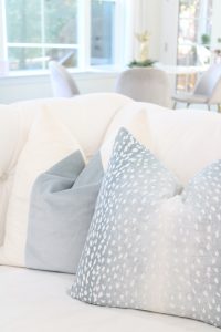 blue velvet color block pillows with blue fawn print pattern pillow covers
