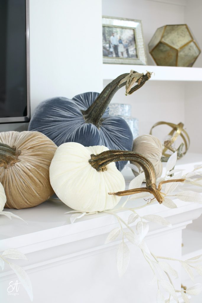 blue velvet pumpkins, hot skwash pumpkins, fall living room decor, fall pumpkin mantel