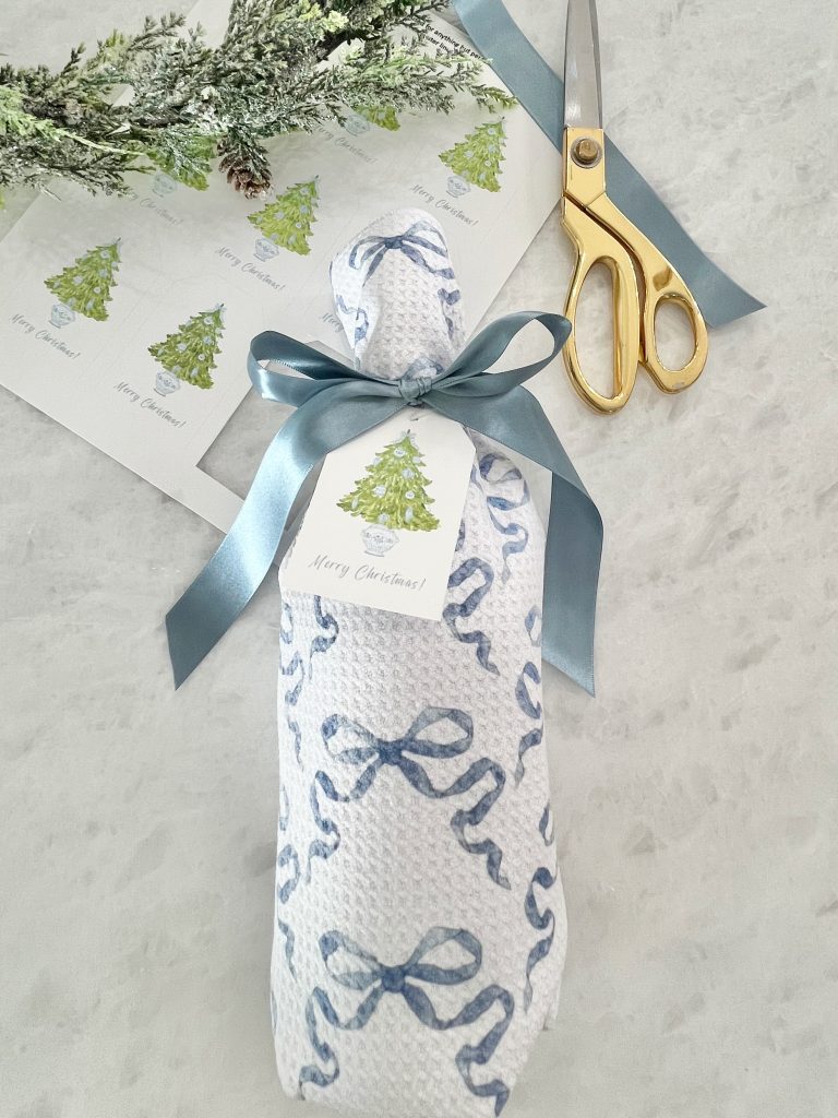 Free Blue Chinoiserie Christmas Gift Tag Download, dish towel wrapped bubbly hostess gift idea, grand millennial style gift decor, coquette style, blue satin ribbon bow, blue christmas